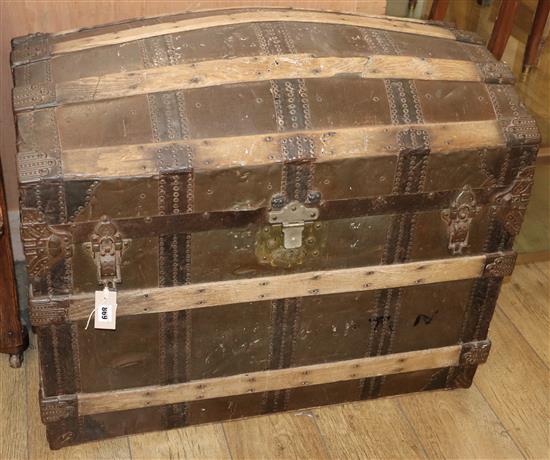 A Victorian brass studded, ash bound domed topped leather trunk